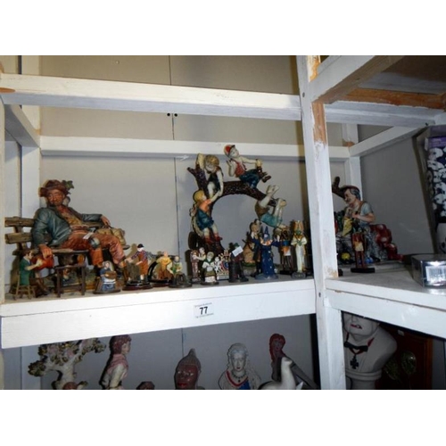 77 - 5 shelves of miscellaneous items including figures etc.