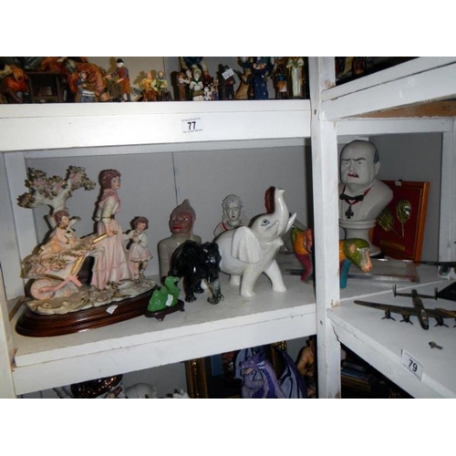 77 - 5 shelves of miscellaneous items including figures etc.