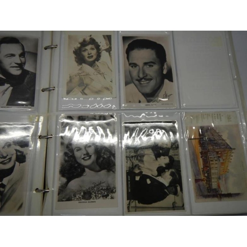 207 - Postcards - An album of approximately 300 postcards including film stars, greeting, topographical et... 