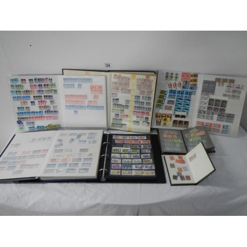 124 - Stamps - 12 stock books of British stamps, mainly Queen Elizabeth II