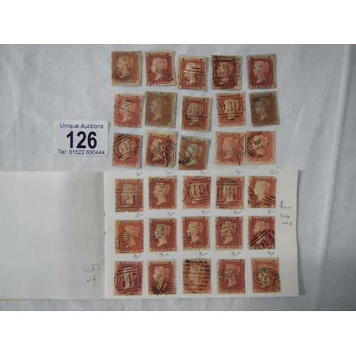 126 - Stamps - A booklet containing over 100 Victorian British Penny Red stamps and a packet of over 50 lo... 