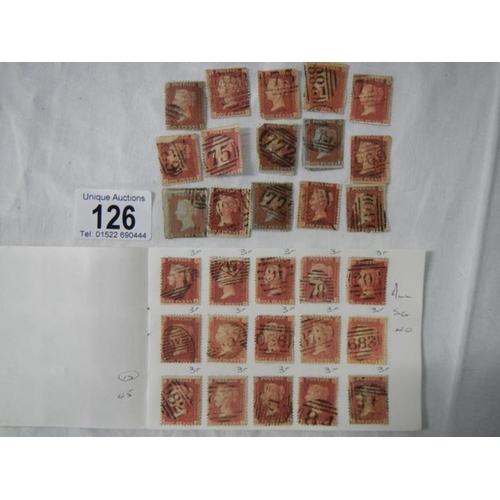 126 - Stamps - A booklet containing over 100 Victorian British Penny Red stamps and a packet of over 50 lo... 