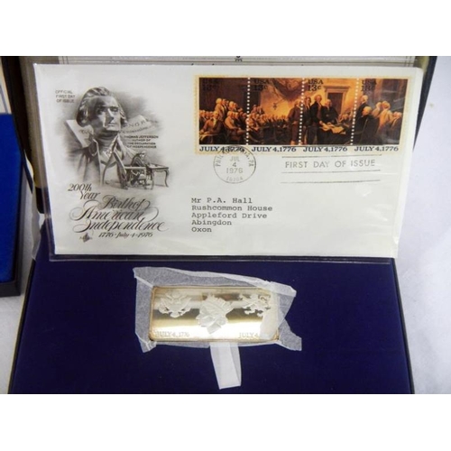 137 - Stamps - 3 cased Danbury Mint 1977 Silver Jubilee ses containing first day covers and silver ingots,... 