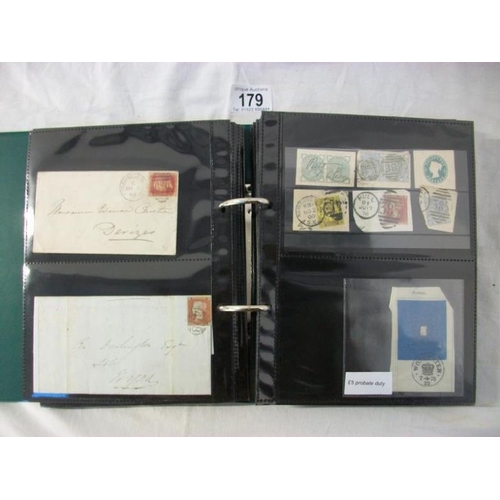 179 - Stamps - An album of c19th Victoria British Empire stamps including entires, envelopes, postcards, p... 