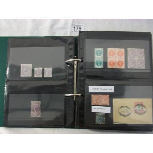 179 - Stamps - An album of c19th Victoria British Empire stamps including entires, envelopes, postcards, p... 