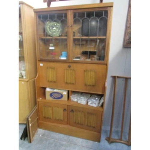 168 - A modern cabinet with linen fold panels