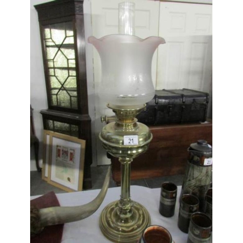 21 - A Victorian brass Messenger column oil lamp with later shade