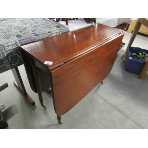 45 - A mahogany drop leaf table