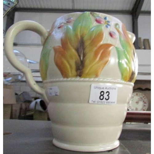 83 - A large Clarice Cliff jug, a/f