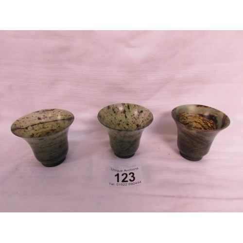 123 - 3 finely turned jade Sake' cups of good colour