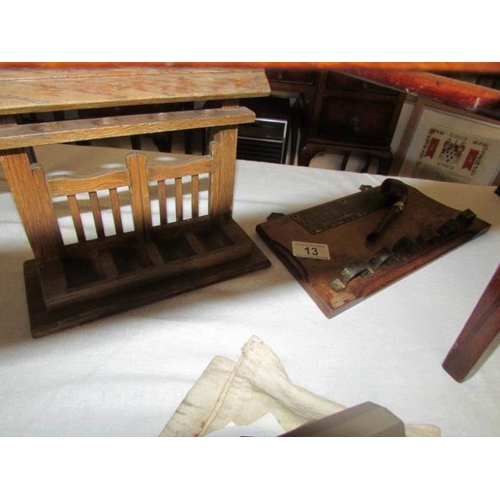 13 - A pipe rack with brass plaque 'Smoke and be happy' and one other