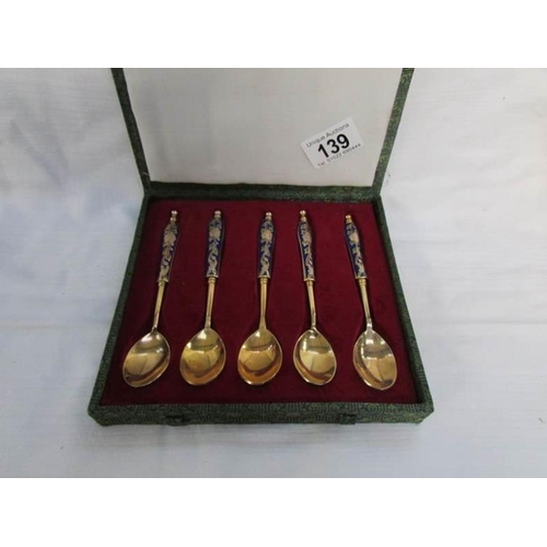 139 - A cased set of Chinese spoons with cloissonne' handles