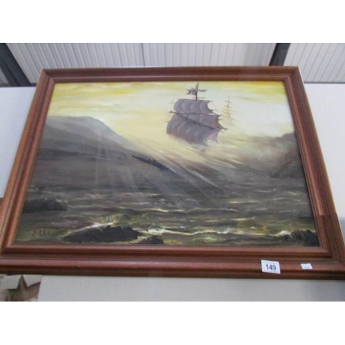 149 - A framed oil on board study of stormy seas