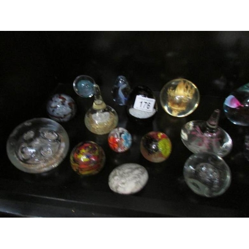 176 - 25 assorted glass paperweights