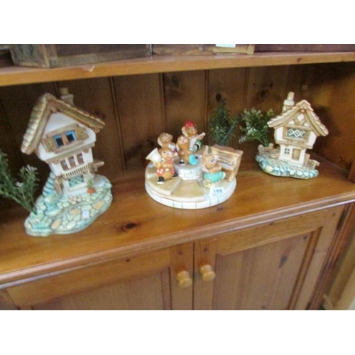 189 - 2 Pendelfin houses, a Pendelfin band stand and 5 Pendelfin figures