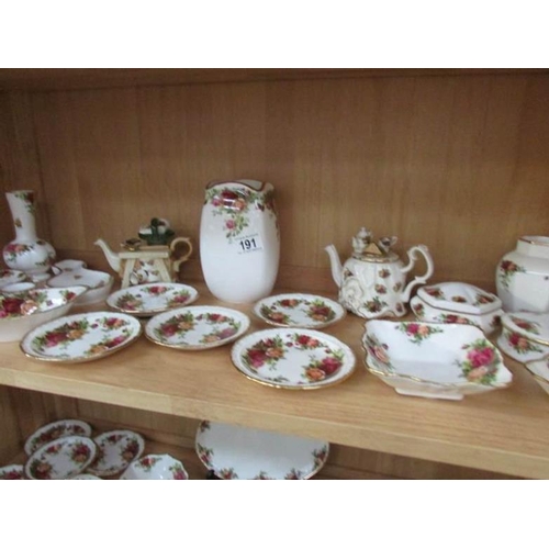 191 - Approximately 60 pieces of Royal Albert Old Country Roses china (3 shelves)