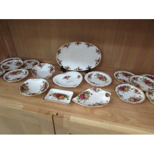 191 - Approximately 60 pieces of Royal Albert Old Country Roses china (3 shelves)