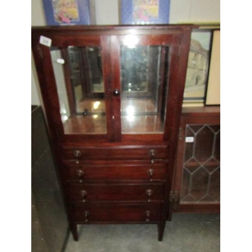 209 - A mahogany music cabinet