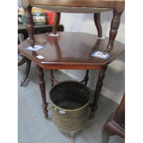 275 - An octagonal mahogany occasional table