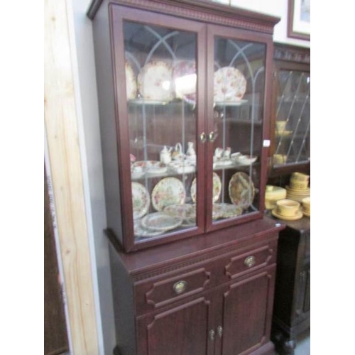 291 - A mahogany glazed top cabinet