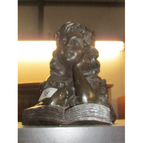 88 - A bust of a young girl reading