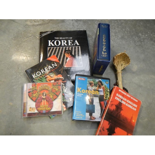 144 - Collection of Korean ephemera including books, music and artifacts relating to South Korea