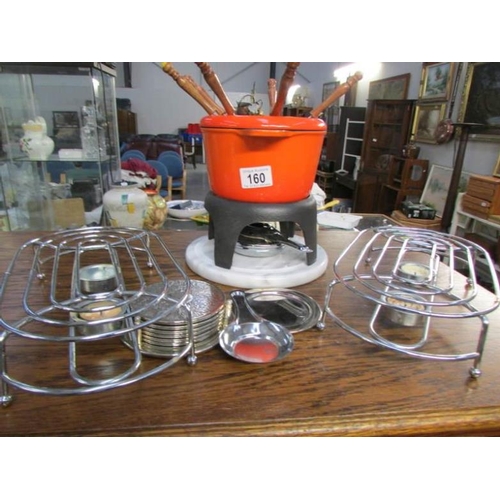 160 - A mixed lot of table ware including fondue set, hors d'ouvre dishes, food warmers etc