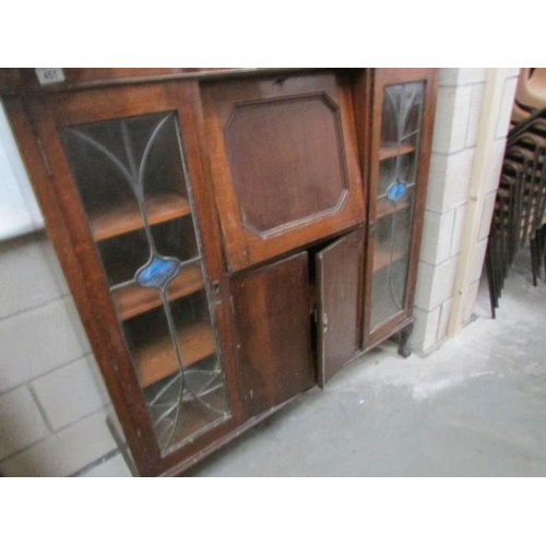 451 - A 1950's oak bureau book case