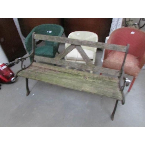 5 - A metal and wood garden bench