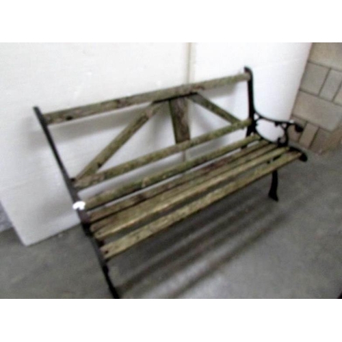 7 - A metal and wood garden bench