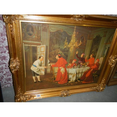 569 - A gilt framed scene with Cardinals, image 72 x 57