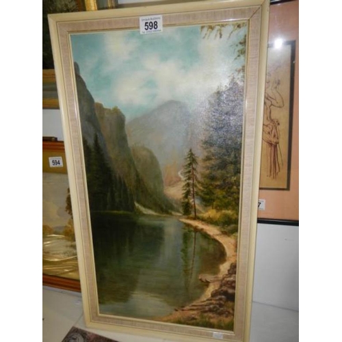 598 - An oil on board mountain scene, image 57 x 29