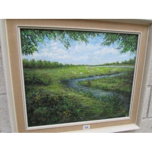 656 - A framed oil on canvas rural scene, image 48 x 59 cm