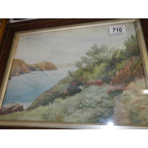 710 - A framed and glazed watercolour coastal scene signed V Leach, 1933, image 33 x 24 cm