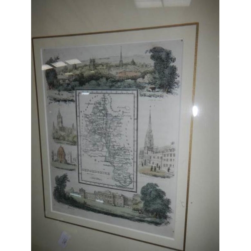 713 - A framed and glazed map of the Channel islands and 2 others