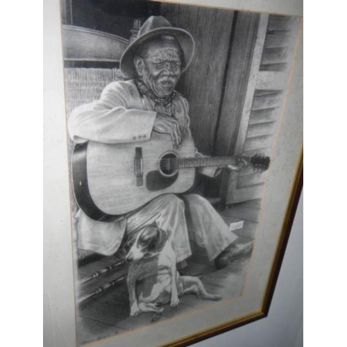 745 - 2 framed and glazed musician prints