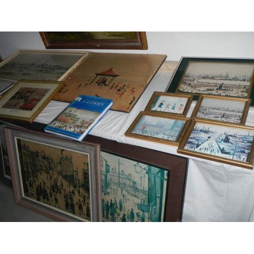 747 - A large collection of L S Lowry prints with books