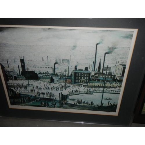 747 - A large collection of L S Lowry prints with books