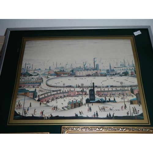 747 - A large collection of L S Lowry prints with books