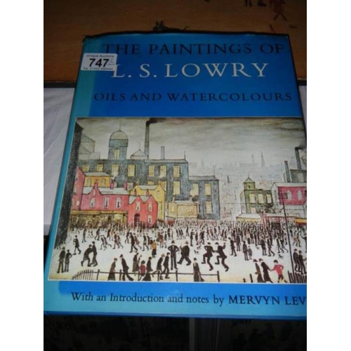 747 - A large collection of L S Lowry prints with books