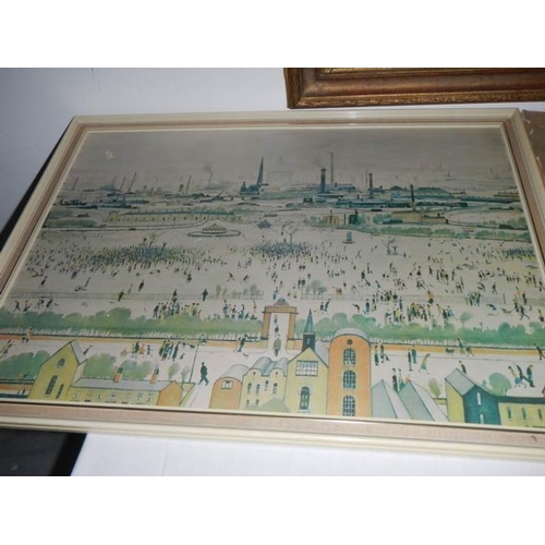 747 - A large collection of L S Lowry prints with books