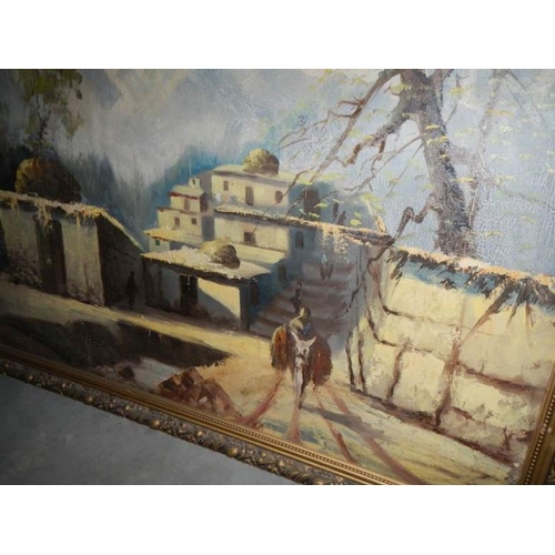 758 - A large oil on board Arabian village, image 98 x 68 cm