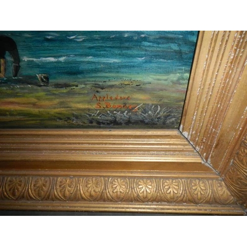 767 - A gilt framed oil on board beach scene, image 69 x 52 cm