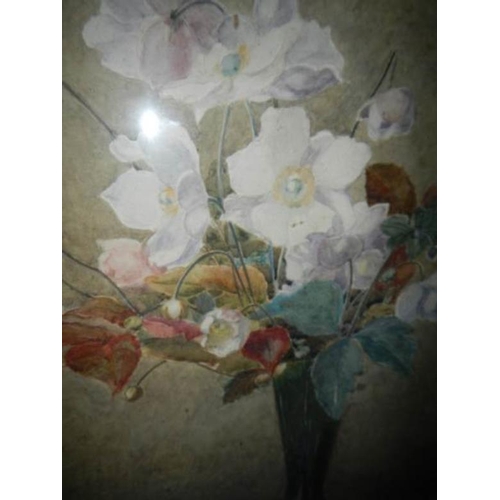 799 - A framed and glazed floral watercolour signed M H Gunn, image 46 x 32 cm