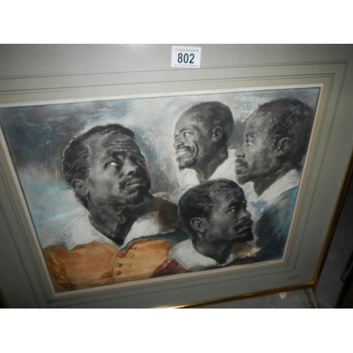 802 - A framed and glazed print, study of 4 Afro/Caribean heads, signed J Chamberlain, image 34 x 45