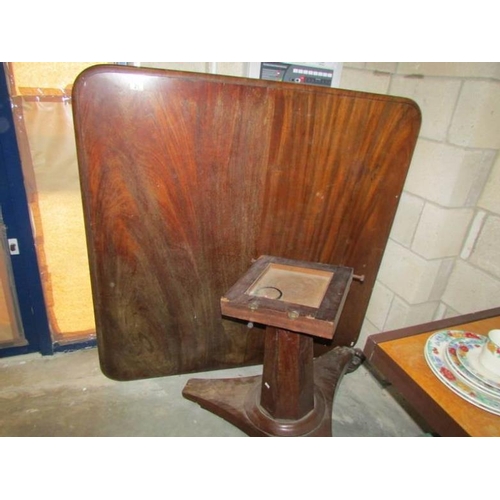 21 - A large square Victorian mahogany table for restoration