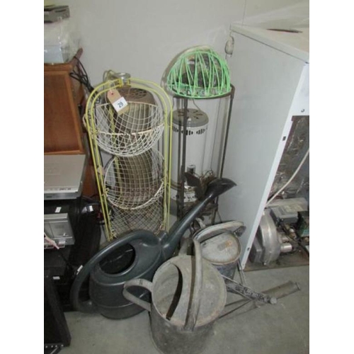 29 - 2 green house heaters, 3 watering cans etc