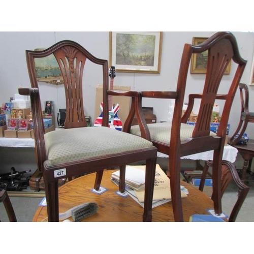 427 - A set of 6 dining chairs