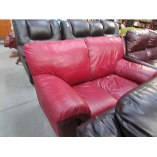 435 - A red leather sofa