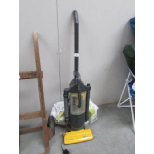 65 - An Electrolux vacuum cleaner and tools